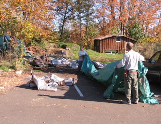 HUGE tarps provide protection from the wet weather.